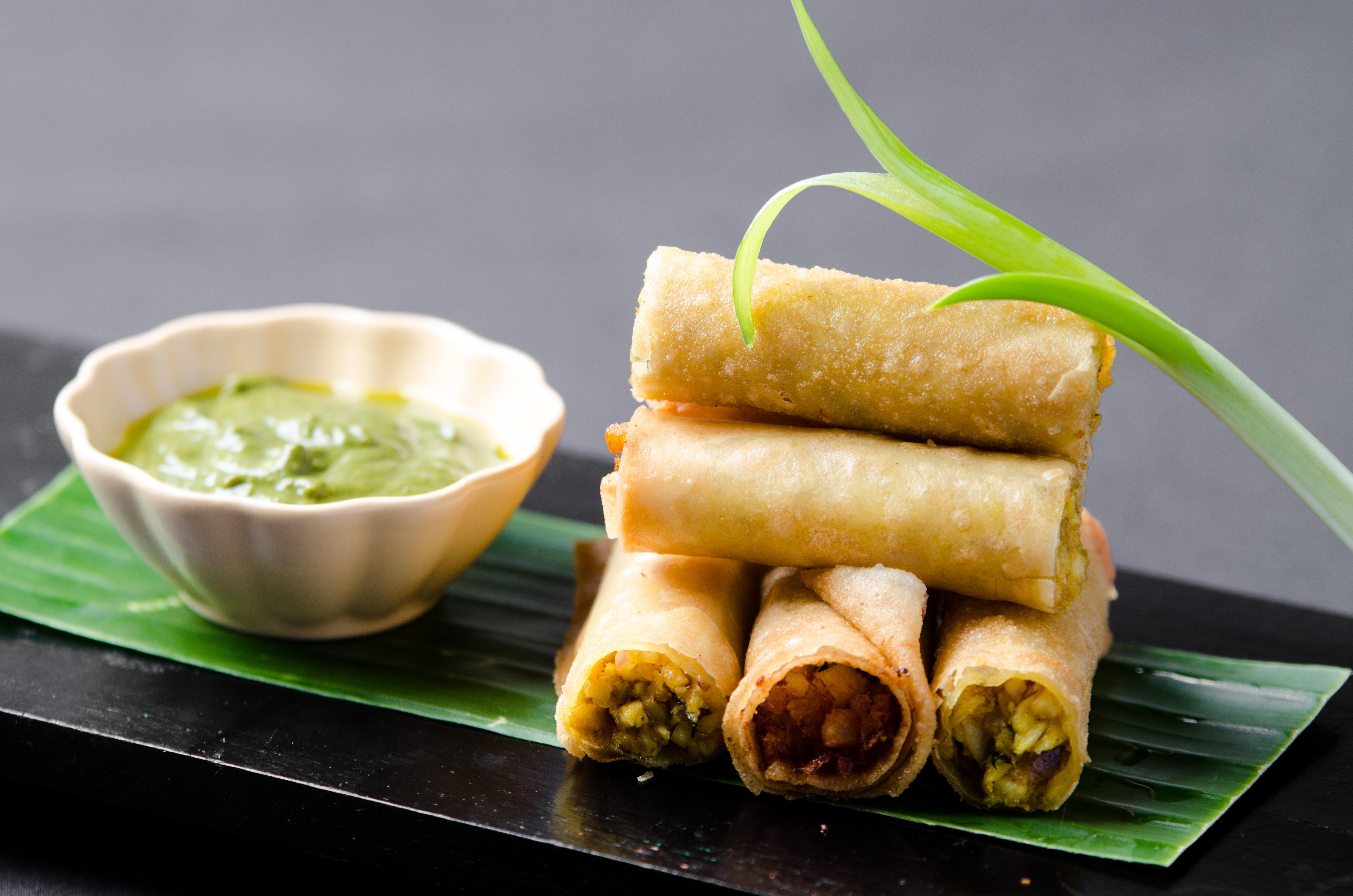 Holiday Inn & Suites Makati By Ihg Makati City Exterior photo Fried vegetable spring rolls